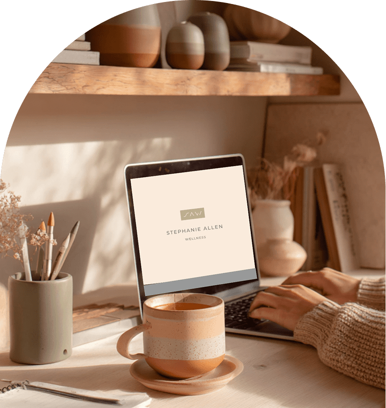 Cozy workspace with a tablet, coffee, and natural decor.